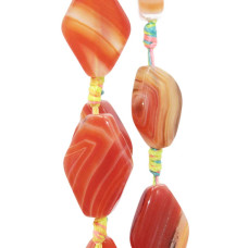 Agata arancio striata rombo 25x16 mm con. 4 pz Agata arancio striata rombo 25x16 mm con. 4 pz