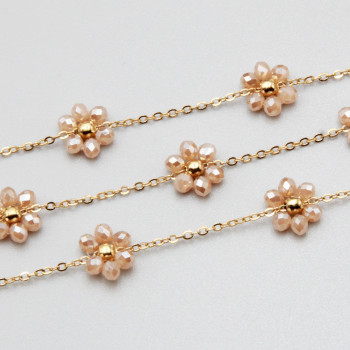 Catena acciaio oro con fiore cristalli cream A/B 10 mm conf. 50 cm