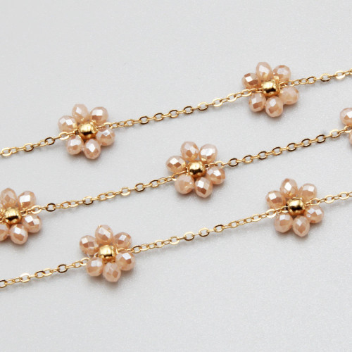 Catena acciaio oro con fiore cristalli cream A/B 10 mm conf. 50 cm
