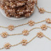 Catena acciaio oro con fiore cristalli cream A/B 10 mm conf. 50 cm
