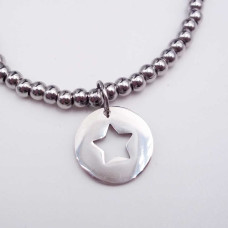 Charms tondo con stella 15 mm pacco 1 pz