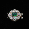 Chiusura a slitta multifilo oro 18x15.5 mm cristallo smeraldo e bianchi conf. 1 pz