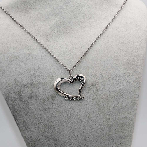 Ciondolo in zama cuore con asole 30x38.5 mm conf. 2 pz