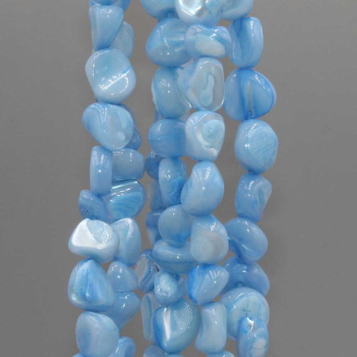 Conchiglie naturali pepite 6/8 mm celesti filo 40 cm