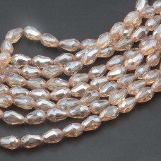 Cristalli gocce champagne 11.5x7.5 mm sfac. filo 45 cm Cristalli gocce champagne 11.5x7.5 mm sfac. filo 45 cm