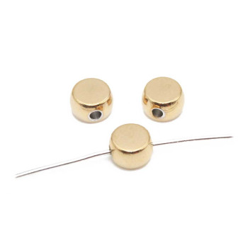 Distanziatori acciaio disco oro 7x4 mm 5 pz