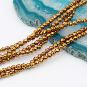 Ematite tonda oro sfacc. 2 mm filo 40 cm