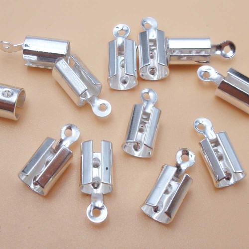 Finali colore argento 10.5x4.5 mm foro 4 mm 30 pz