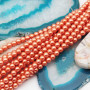 Perle cerate grado A++ tonde arancio 4 mm filo 40 cm
