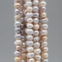 Perle di fiume potato riflessi grigi e oro 6/7 mm filo 35 cm