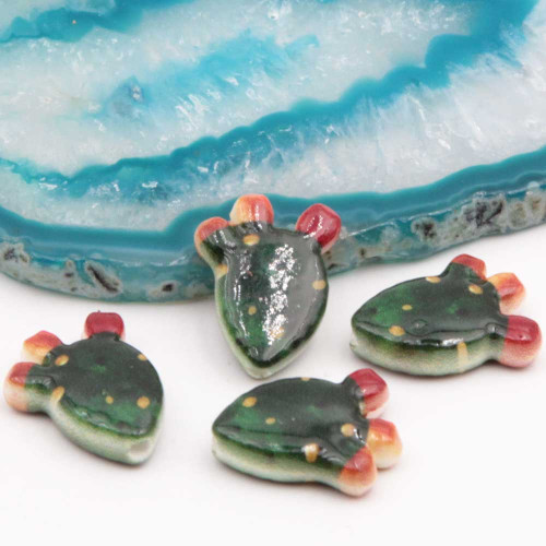 Perline in ceramica cactus verde rosso 17x13 mm conf. 2 pz