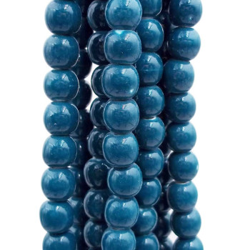 Perline in ceramica verde bottiglia 6x5.4 mm filo 32 cm