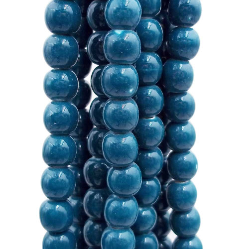 Perline in ceramica verde bottiglia 6x5.4 mm filo 32 cm