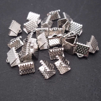 Finali dentati rodiati 8x6 mm pacco 10 pezzi 